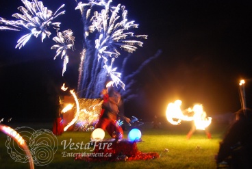 Fire dancers with Fireworks in Victoria